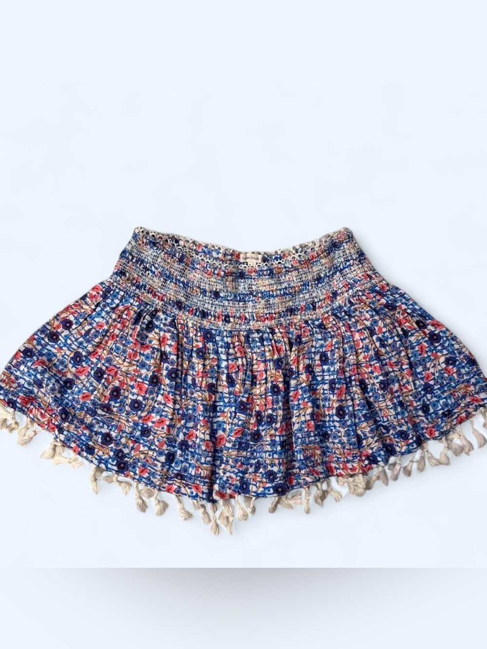 Poupette St Barth Blue and Coral Floral Smocked Mini Skirt with Tassel Trim